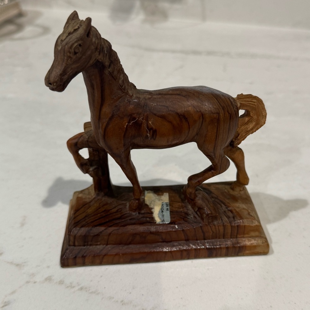 Vintage hand-carved wooden horse figurine